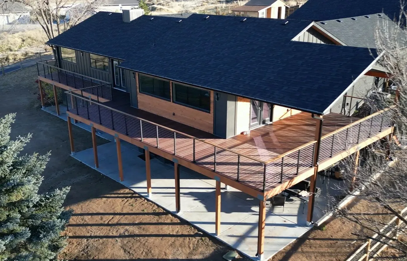 Aerial view of a home addition and deck built by DSC