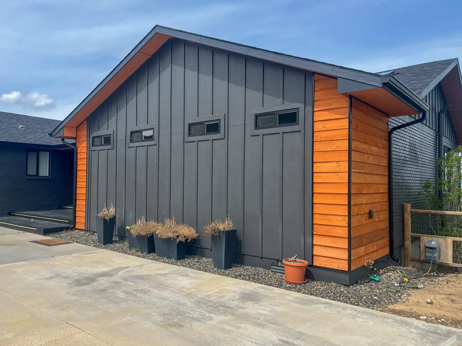 Modern grey and cedar ADU exterior designed and built by DSC