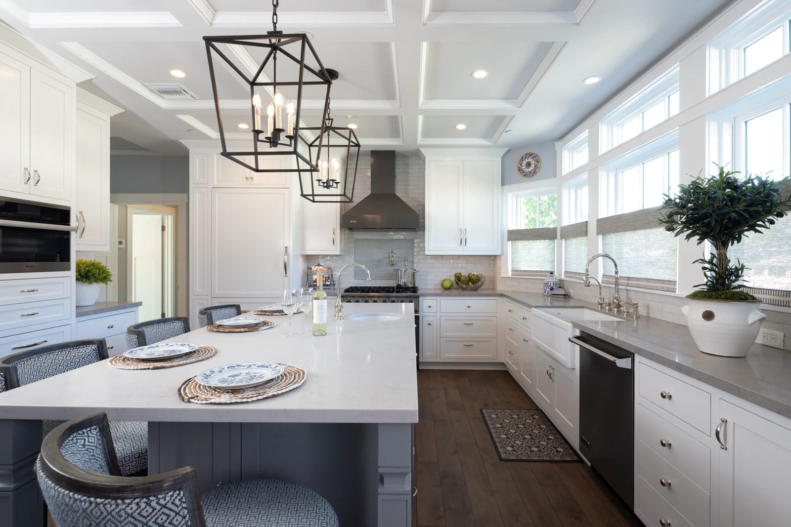 White kitchen remodel with large island by DSC
