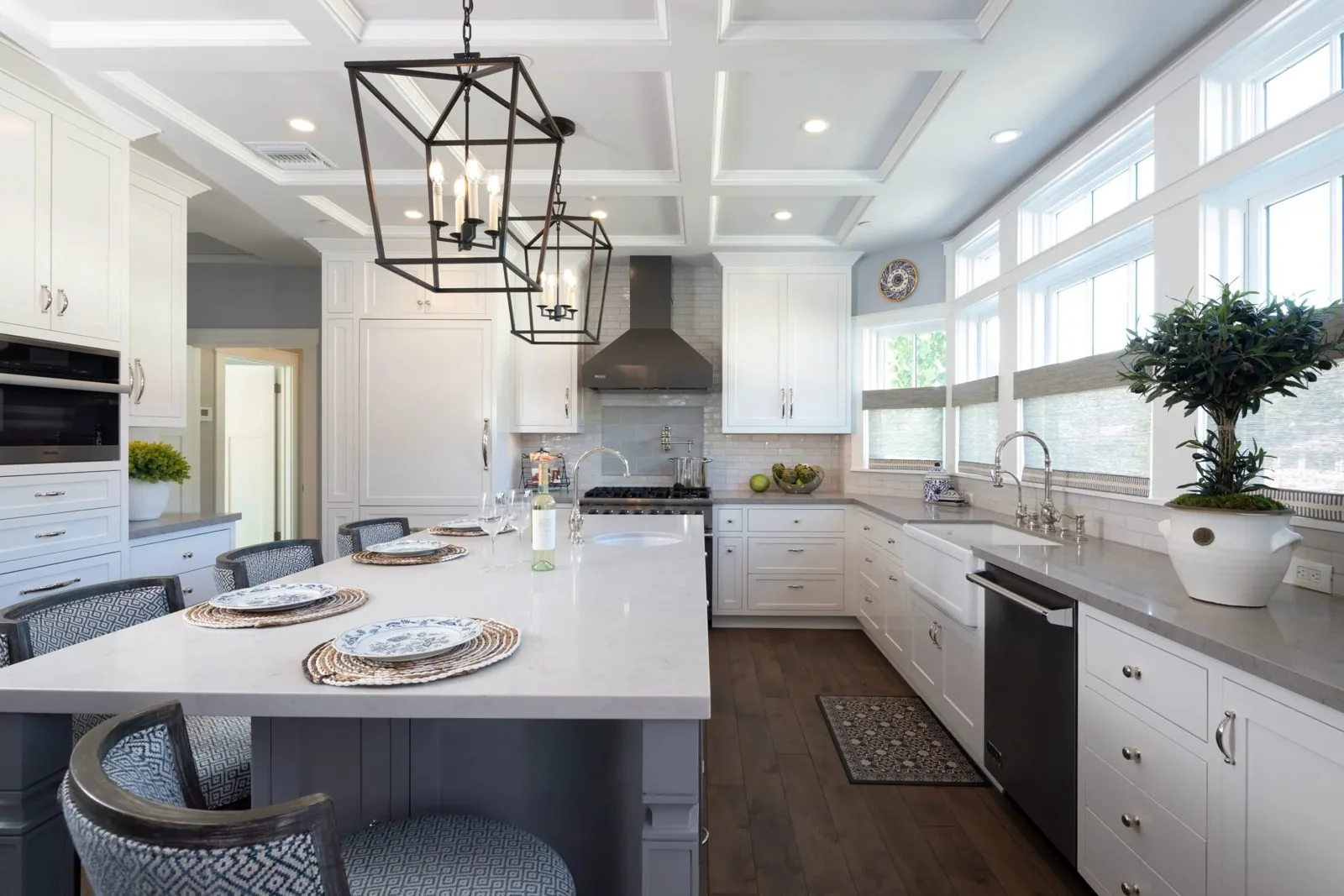 White kitchen remodel with large island by DSC